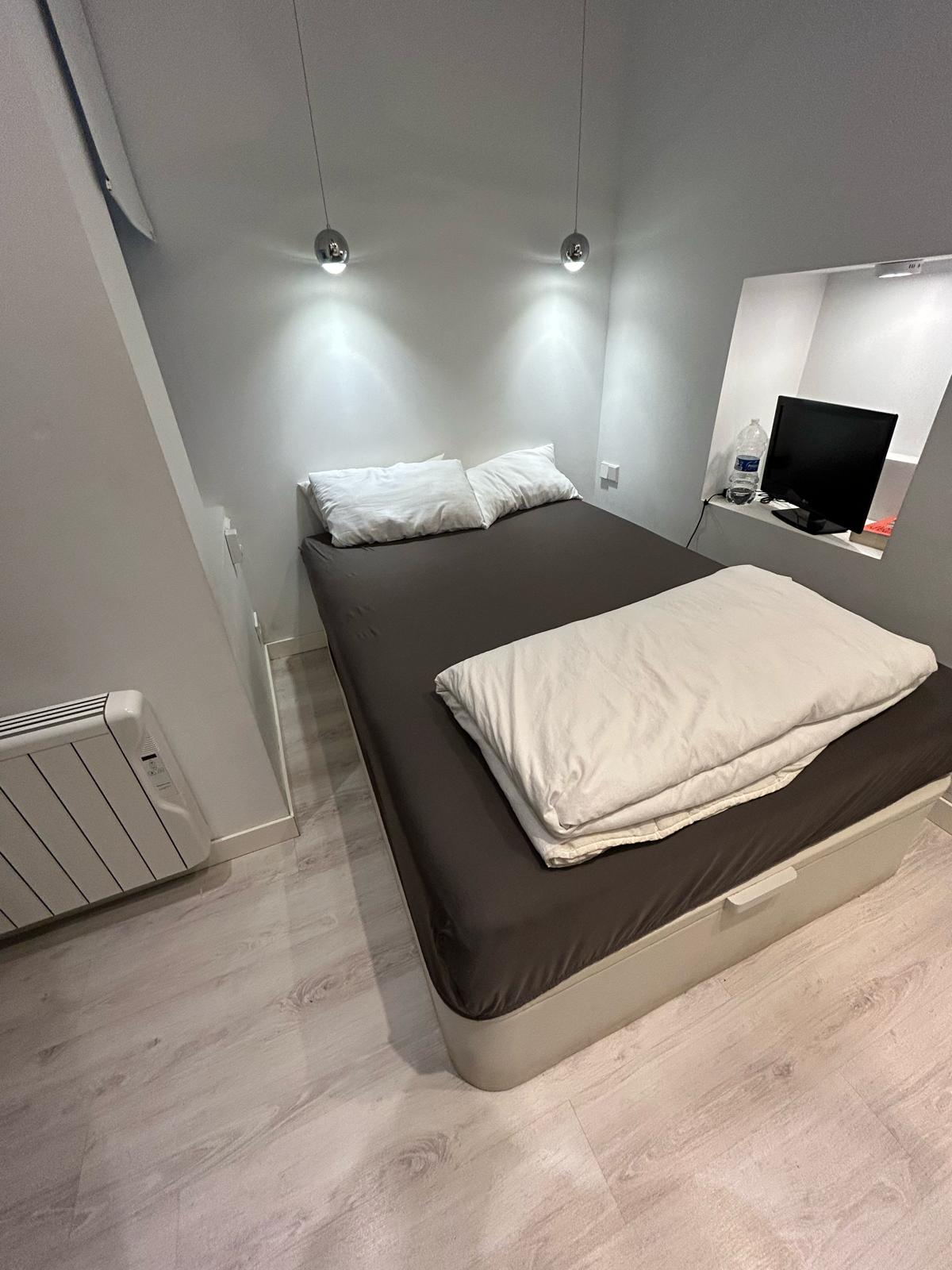Cama canapé con almacenaje y colchón Queen size