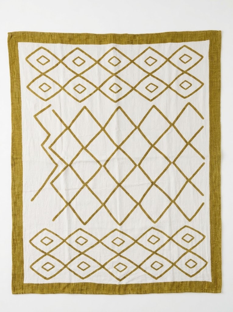 Toalla blanca y ocre, estampada