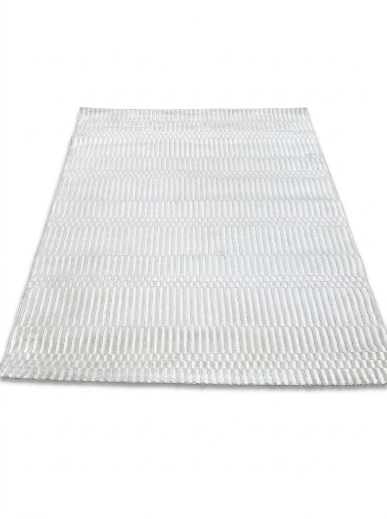 Alfombra blanca dibujos geometricos